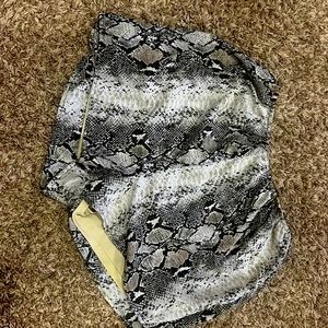 Snake print shorts lots of stretch to them size M
